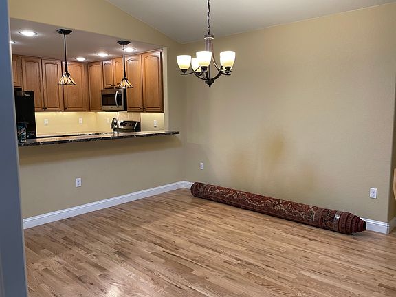 Raised kitchen bar and dining area.