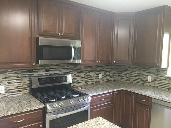 Kitchen with new gas appliances and double oven