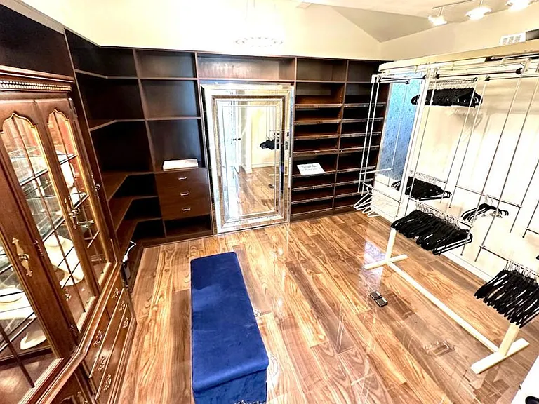 Amazing primary bedroom walk in closet!