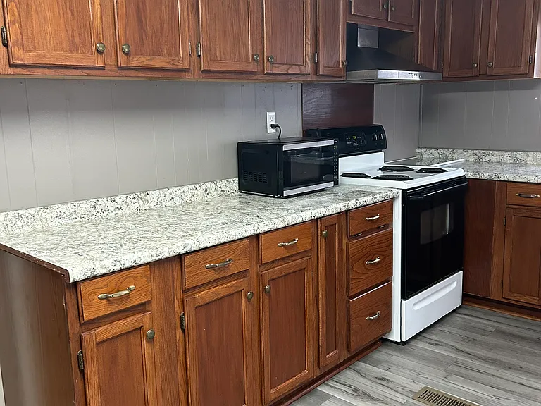 Closer view of cabinets. Lots of counter space