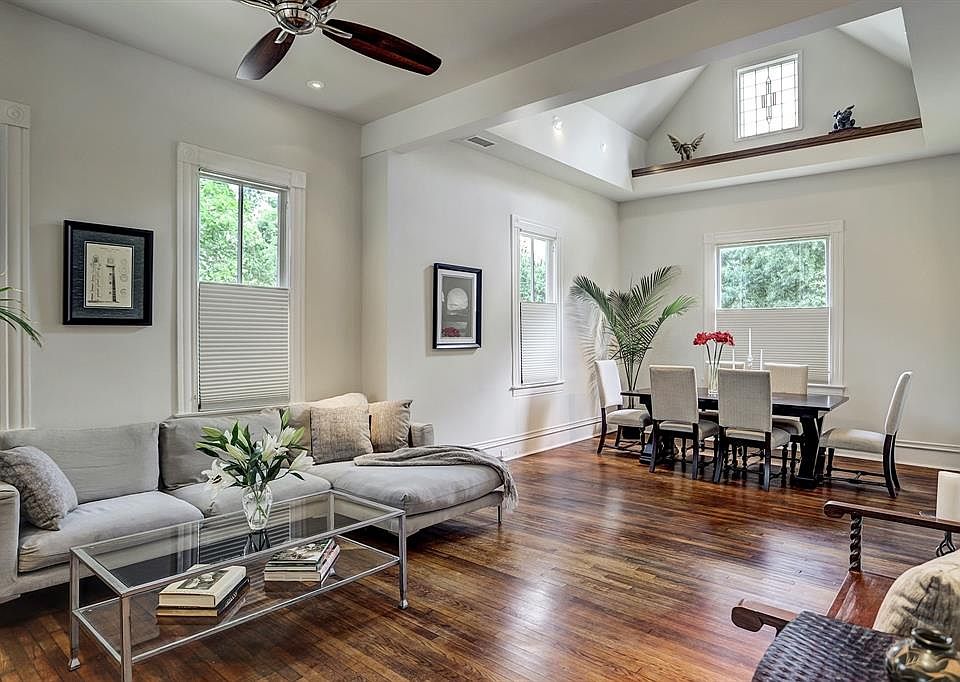 This bungalow has been beautifully reimagined, complete with open concept living, vaulted dining ceiling, and custom millwork and lighting throughout.