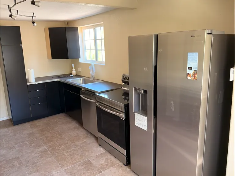 9305 Thompson Ave — Photo 4