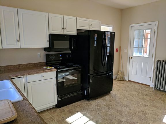 Kitchen with door to porch