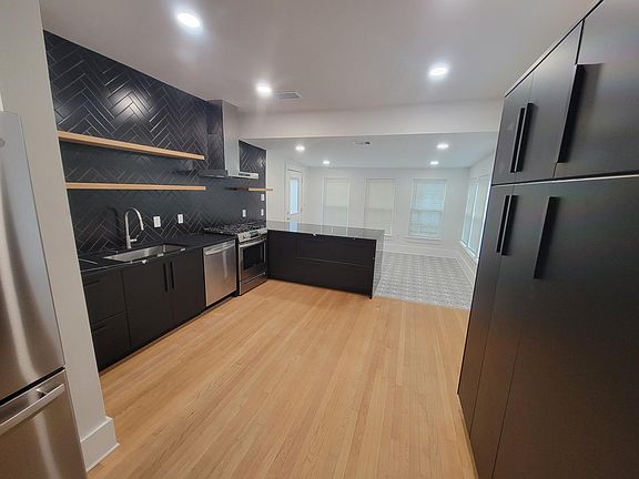 Kitchen is an open concept that leads into the breakfast nook. Lots of storage
