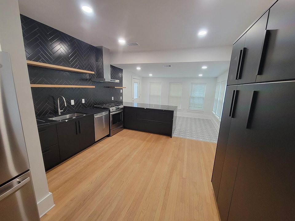 Kitchen is an open concept that leads into the breakfast nook. Lots of storage