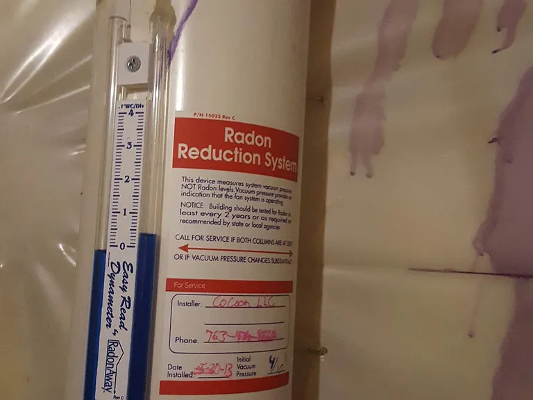 Utility room radon mitigation system