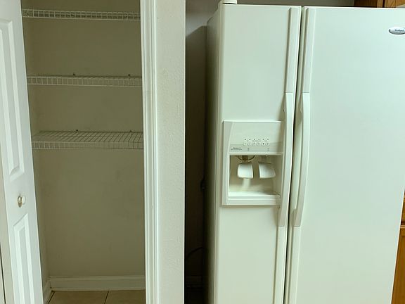 pantry & fridge in the kitchen