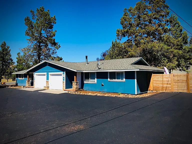 View of front of unit showing assigned parking spots in front