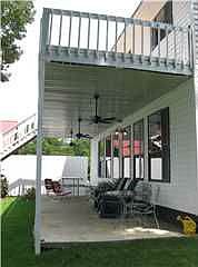 Sun Deck of Master Bedroom and Covered Patio from Sun Room (waterfront view)