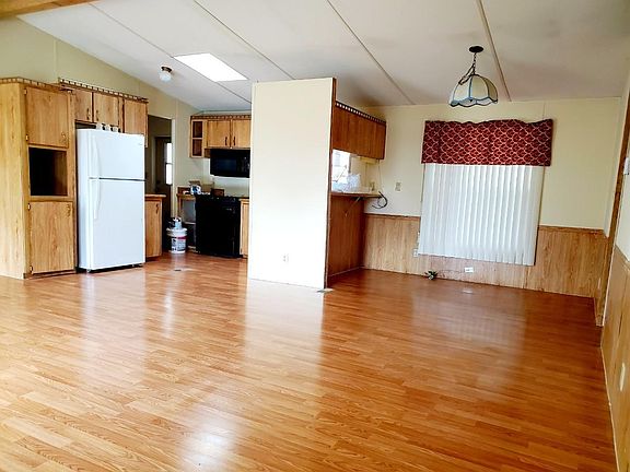 View to right is dining room and counter bar.