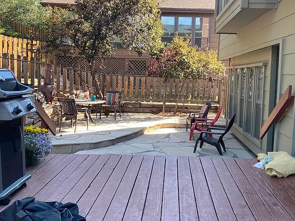 Backdeck over looking larger flag stone patio