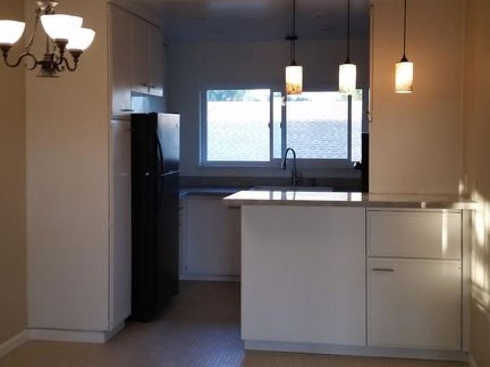Kitchen area with bar top