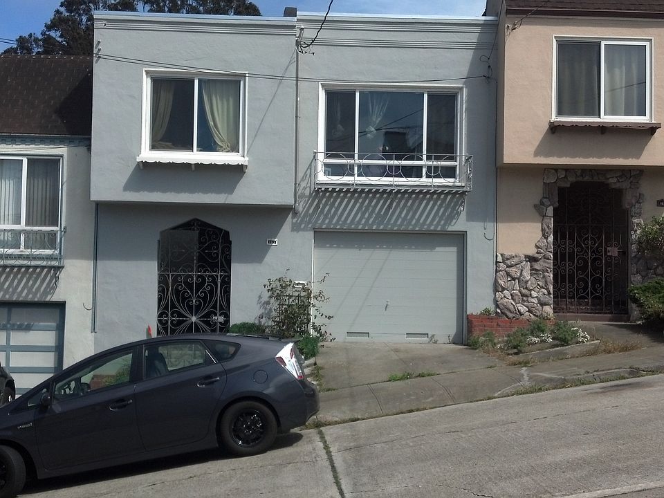 Exterior, light gray stucco