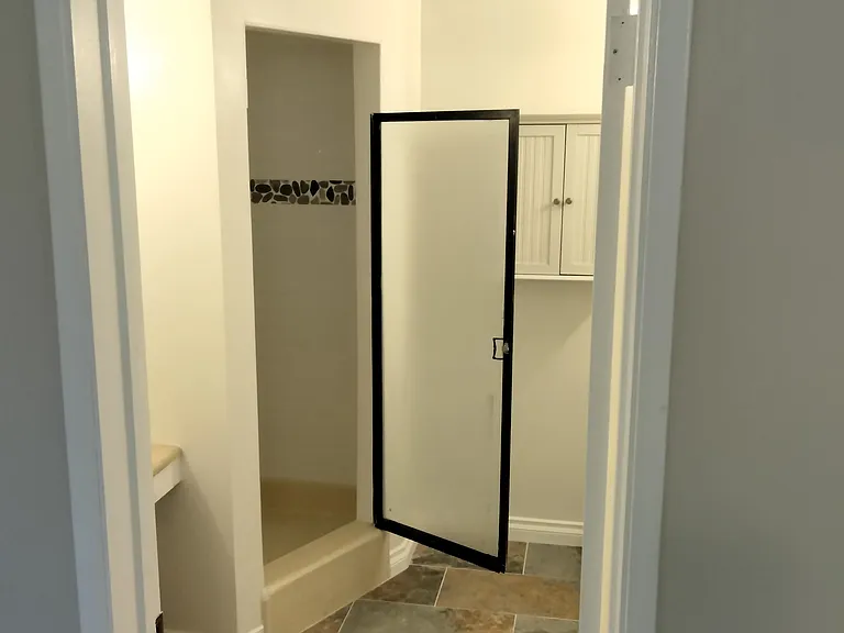 Bathroom attached to East Bedroom, shower only, ceiling heater
