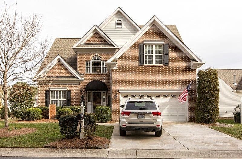 Contemporary brick home in lovely gated community in N. Durh