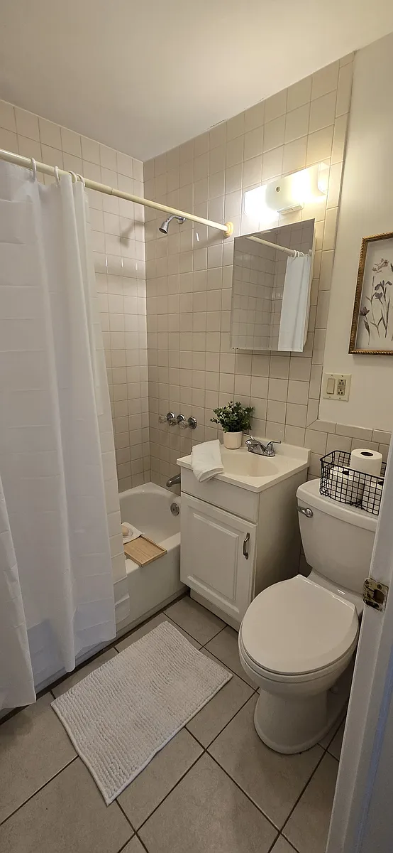 Full bathroom. It's bright and freshy painted. - 100 Melvin Ave #A