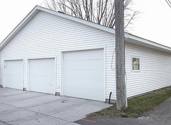 HUGE Detached 3 car Garage and insulated/heated workshop, perfect for your at home business or hobbies!