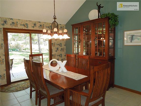 Large Dining area with access to patio and beautiful backyard.