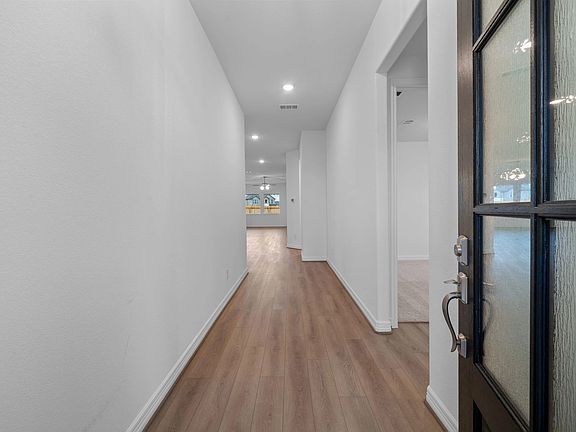 Welcome home! Step inside through the inviting entryway that seamlessly flows into the open-concept