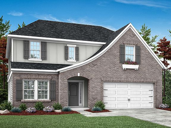 Enjoy the luxurious euro elevation. This euro style home features a large amount of brick and an ele