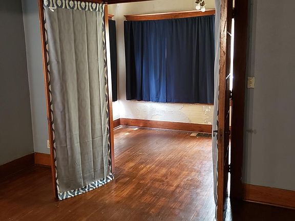 French doors lead to third bedroom/sunroom