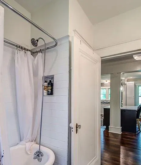 Downstairs bathroom with clawfoot tub/ shower