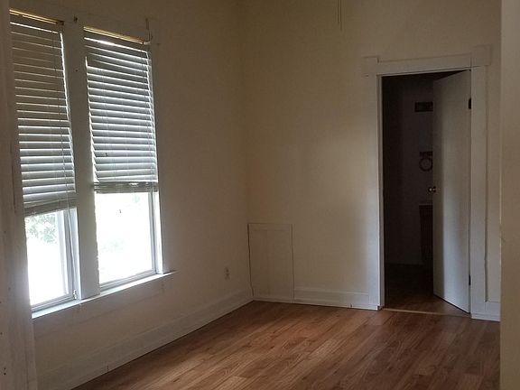 Bedroom and door into bathroom