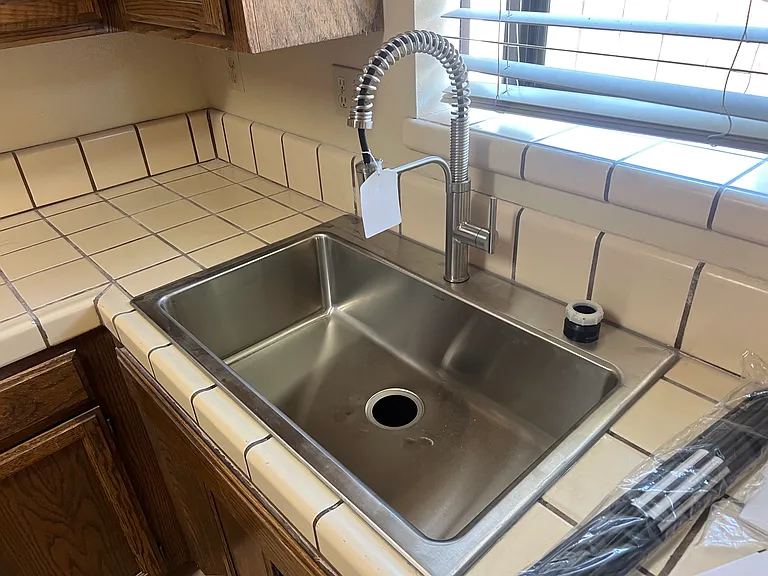New sink, faucet and garbage disposal