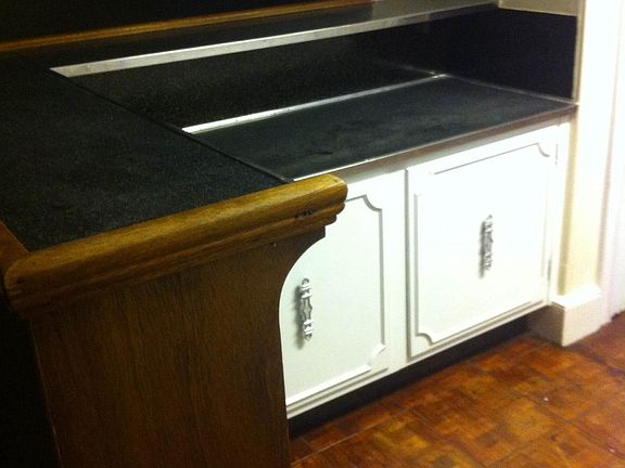 Large kitchen with plenty of counterspace, breakfast bar, and pantry.