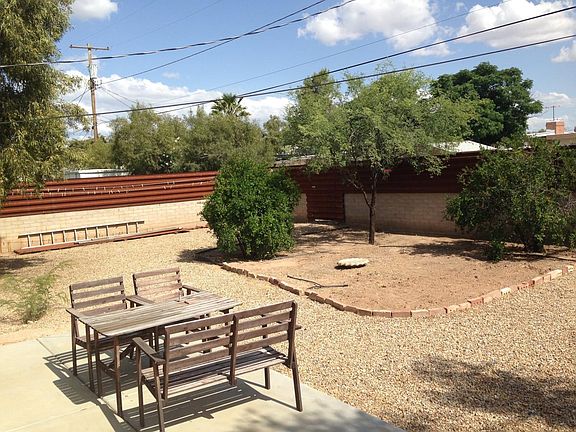 Large backyard perfect for gardening.
