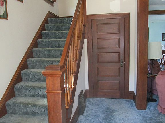 Formal entry with open stair