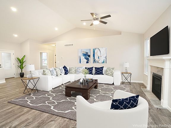 Great Room With Optional Gas Fireplace, Cathedral Ceiling in Open To Kichen Dining Area