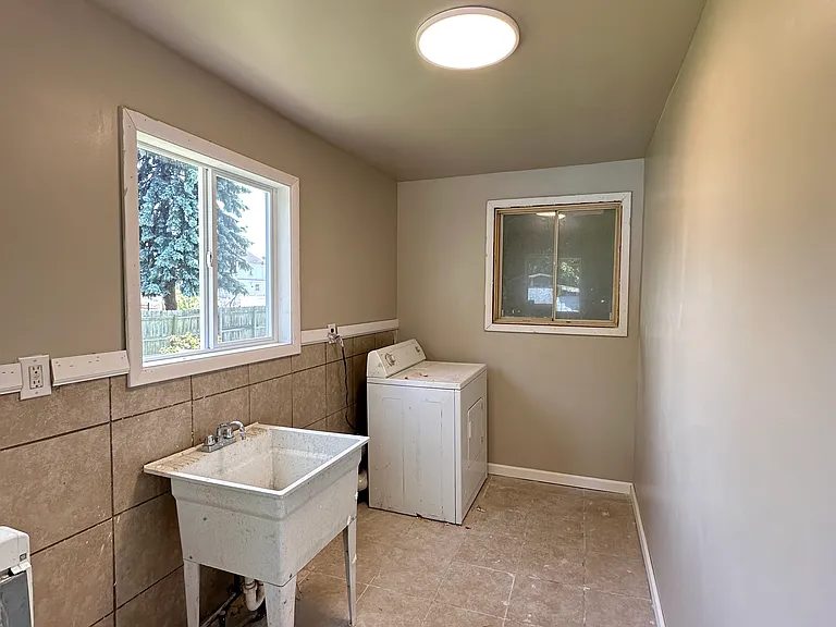 Laundry room. Comes with dryer