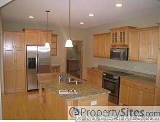 3rd image of 10724 Toledo Ln N