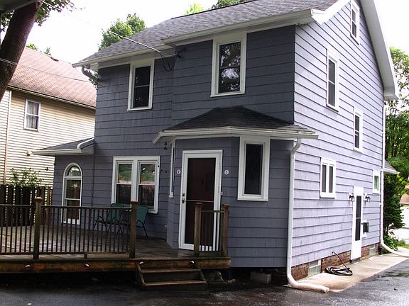 back of house w/ deck