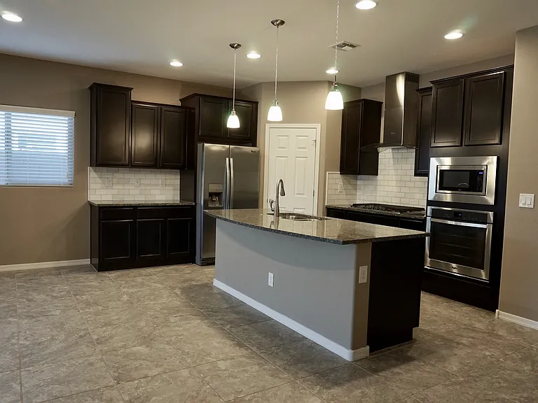 Kitchen with island and dinette
