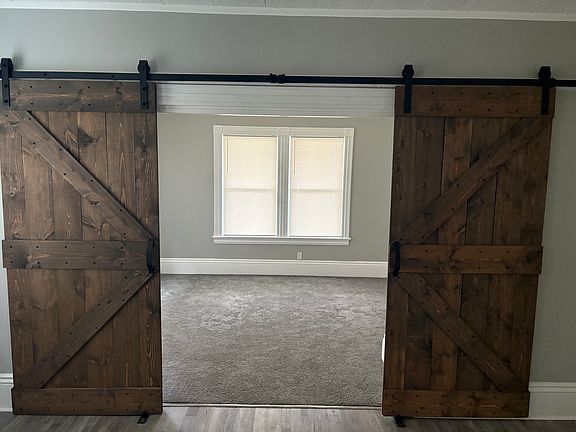 MASTER BEDROOM WITH BARN DOORS