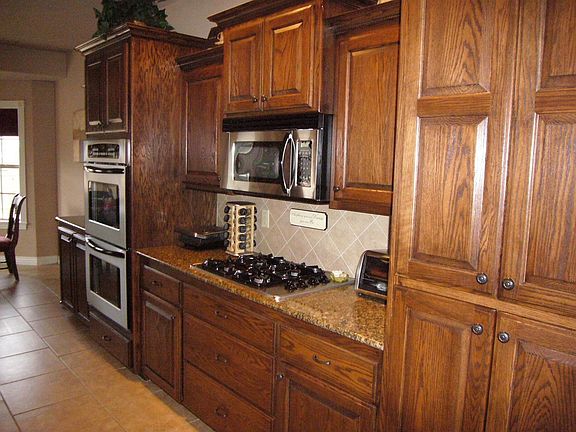 Stainless appliances tile floors