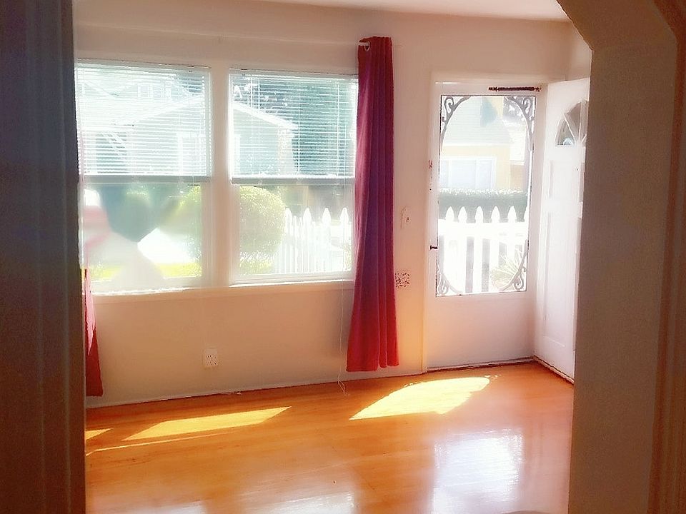 Living room as seen through kitchen pass through window