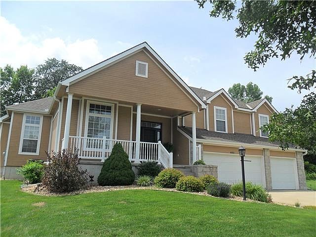 Front elevation   Nicely landscaped & with inviting entry