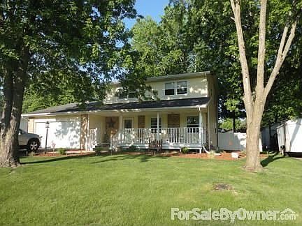Front of Home
						:
						Large yard, long driveway, beautiful white front porch!