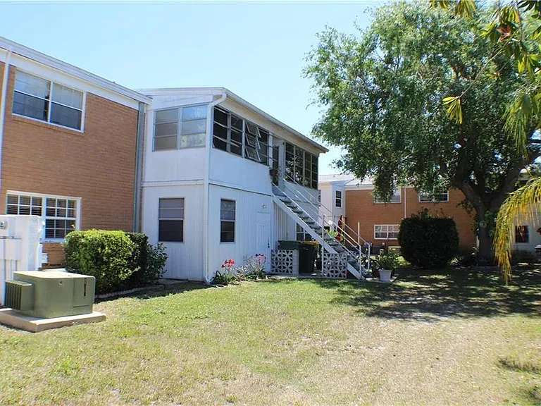 Back Entrance to Apartment that leads to pool.