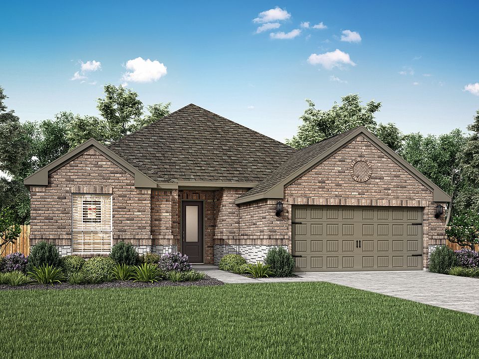 The Houghton is a single story home with brick and stone.