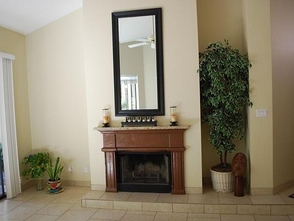 Living room with wood burning fireplace