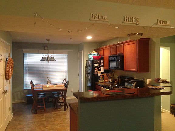 open view into kitchen, pantry door