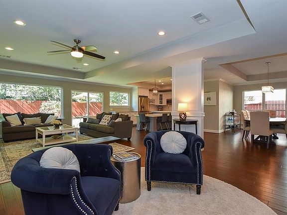 Generous size family room, or section it off for a sitting area with plenty of room for your every day living. Gorgeous wood floors, updated windows with views of the backyard.