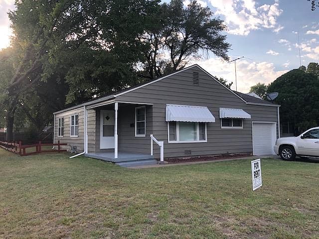 Spacious corner lot with mature shadetrees in back yard