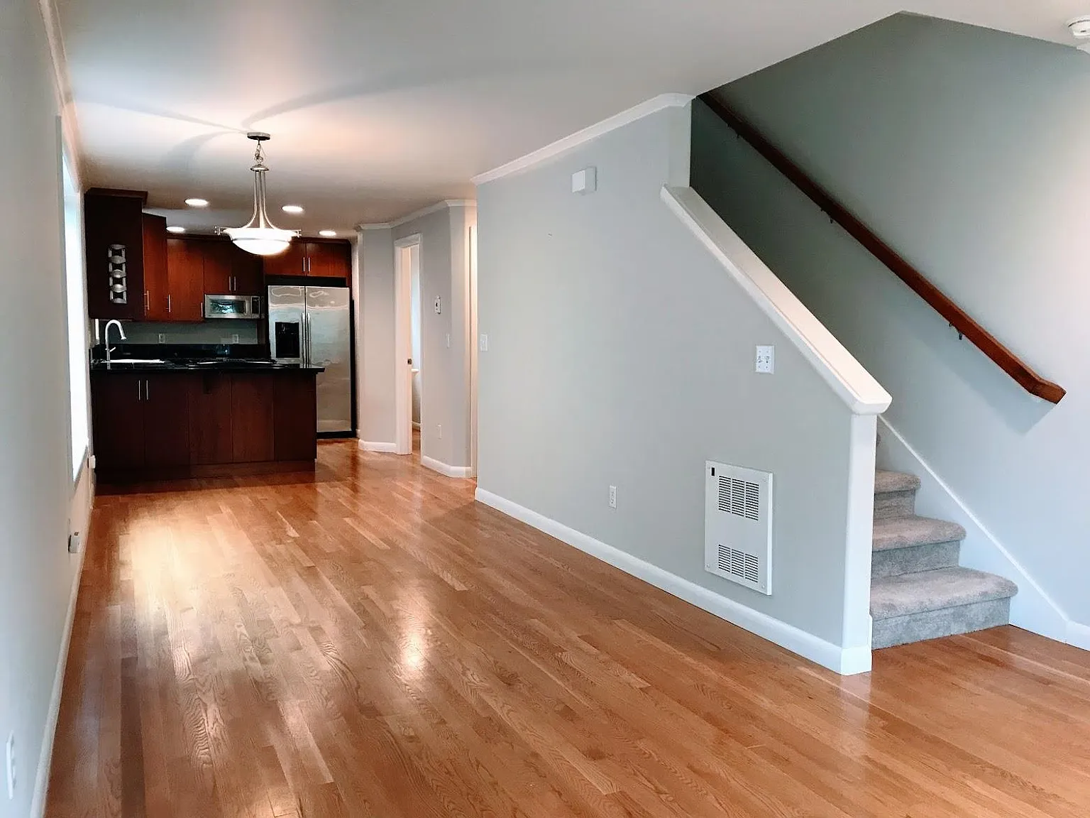 Open kitchen, dining, living space