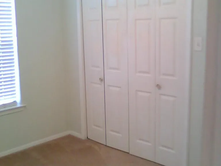 smallest bedroom with 8 ft. closet