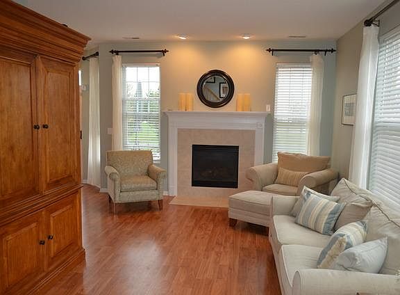 Living room with gas fireplace.